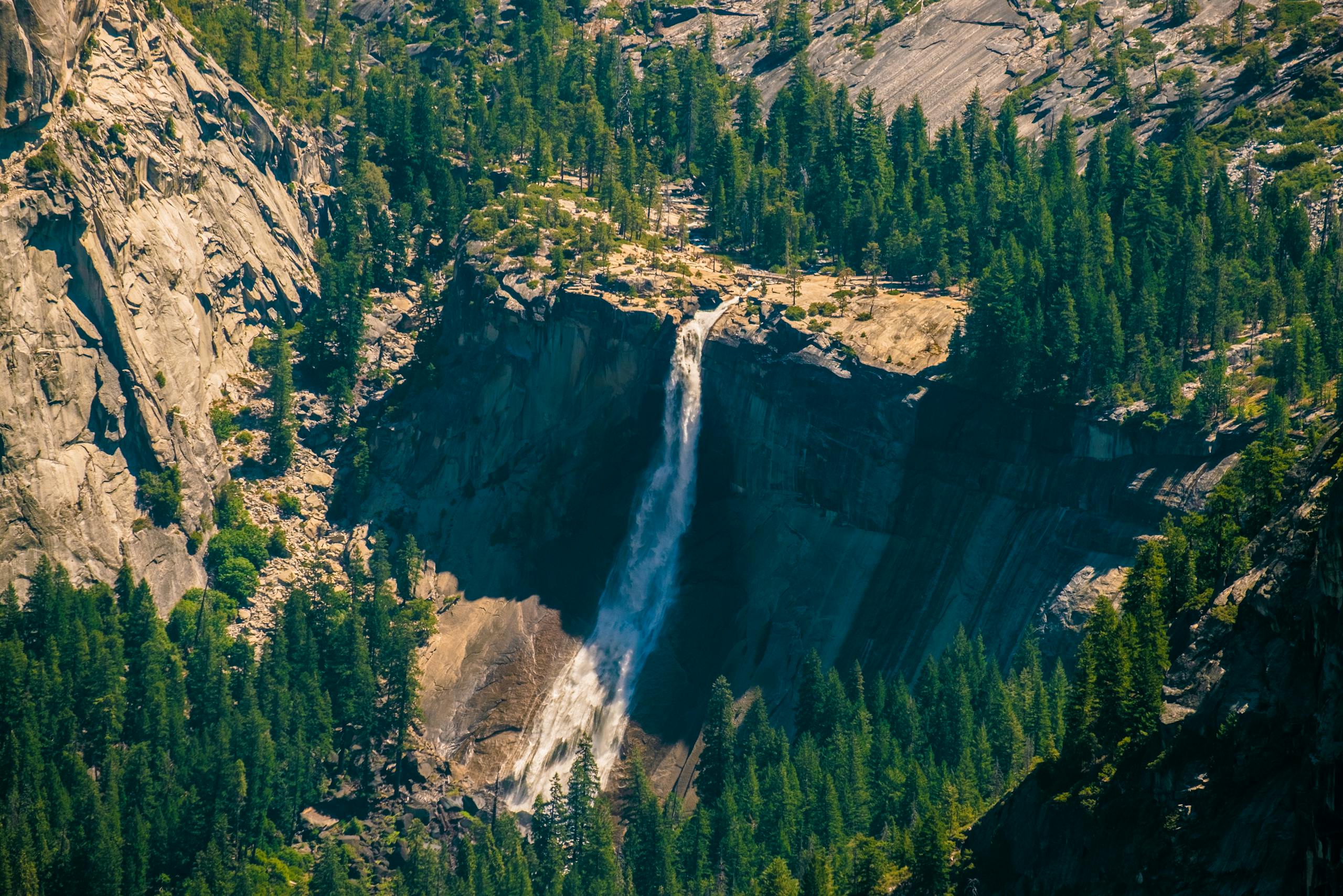 Green Trees and Waterfalls on Mountain